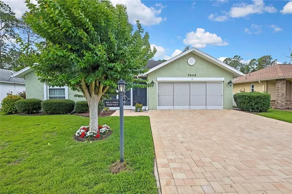 $355,000 | 7052 Sparkling Creek Court, Spring Hill, FL 34606