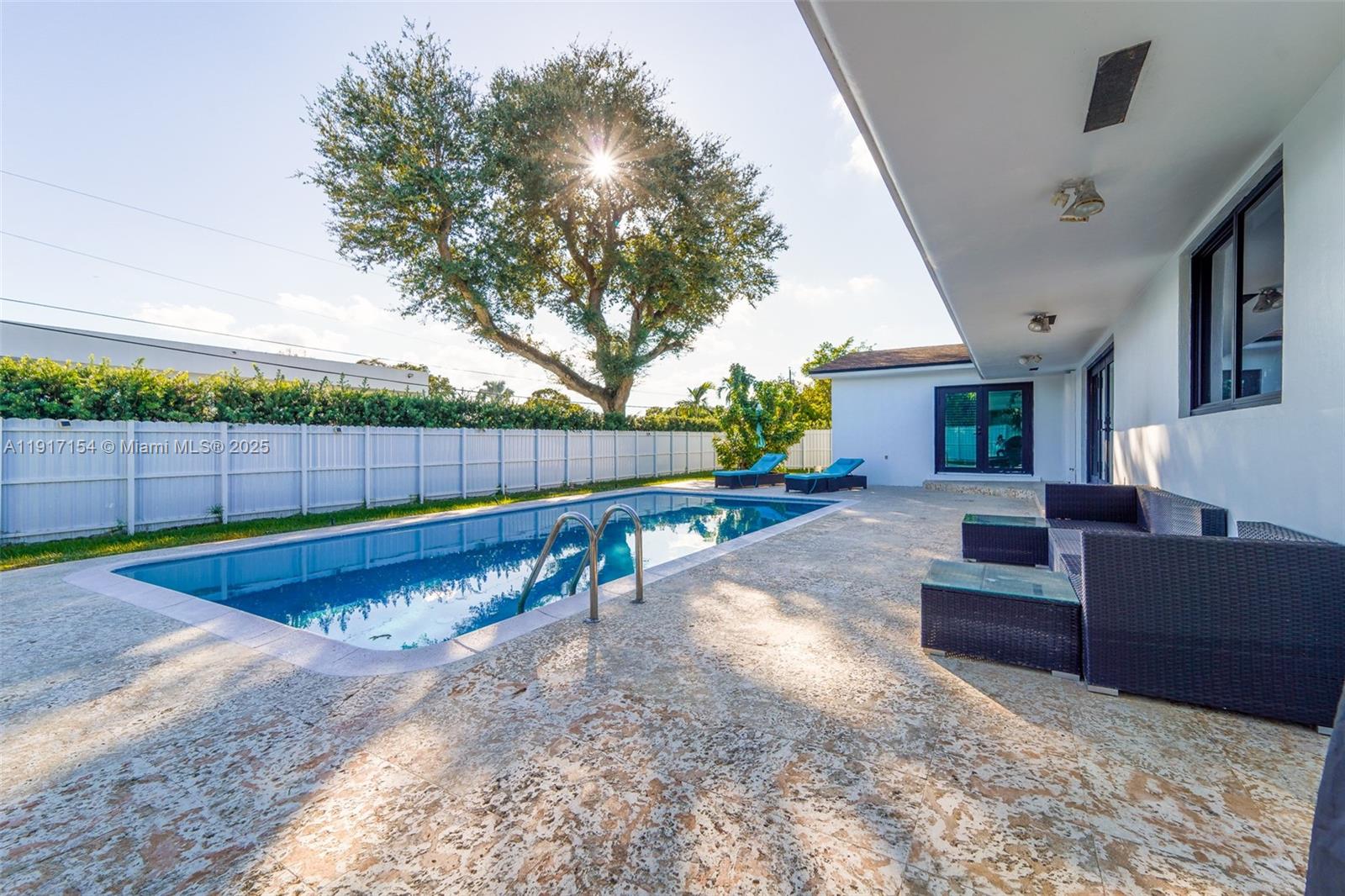 1850 Northeast 199th Street Miami, FL 33179 - Photo 19 of 29 a view of a couches in the patio