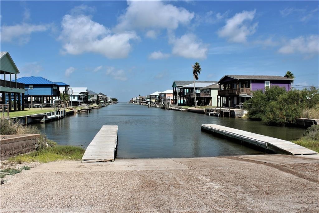 423 Palmetto Point Road Rockport, TX 78382 - Photo 13 of 21 a view of a lake with a house