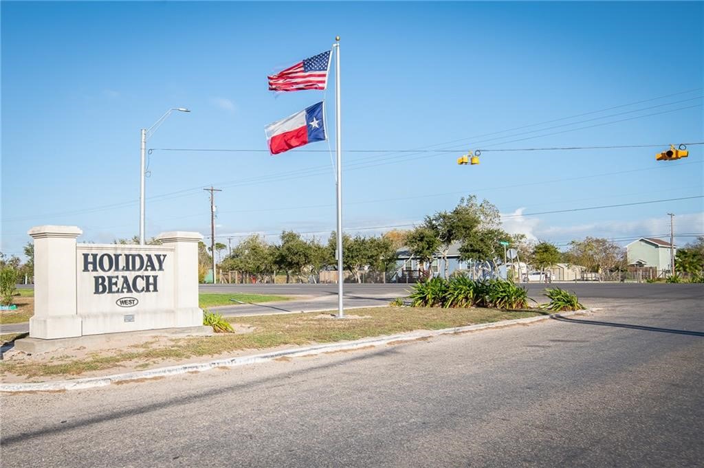 423 Palmetto Point Road Rockport, TX 78382 - Photo 16 of 21 a sign board on the side of a road