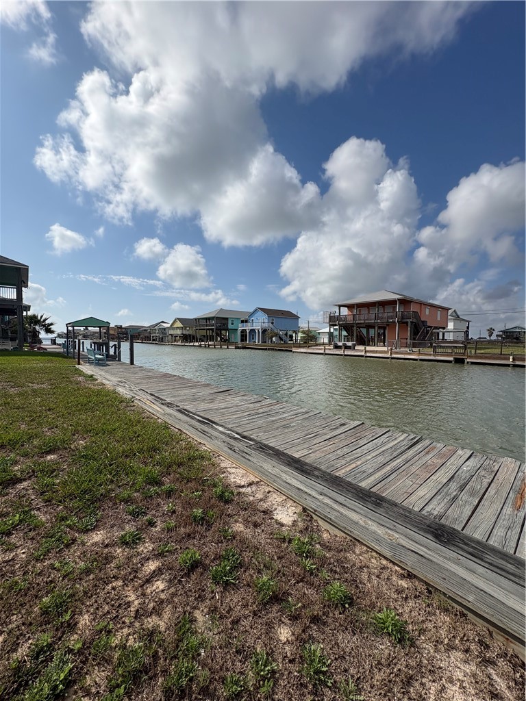 423 Palmetto Point Road Rockport, TX 78382 - Photo 2 of 21 a view of a lake with houses in back