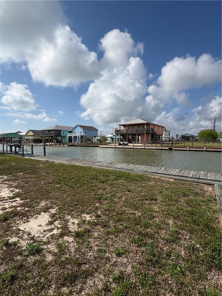 423 Palmetto Point Road Rockport, TX 78382 - Photo 4 of 21 a view of a lake with houses in the back