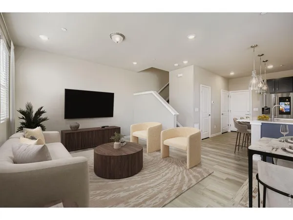 a kitchen with a table and chairs in it