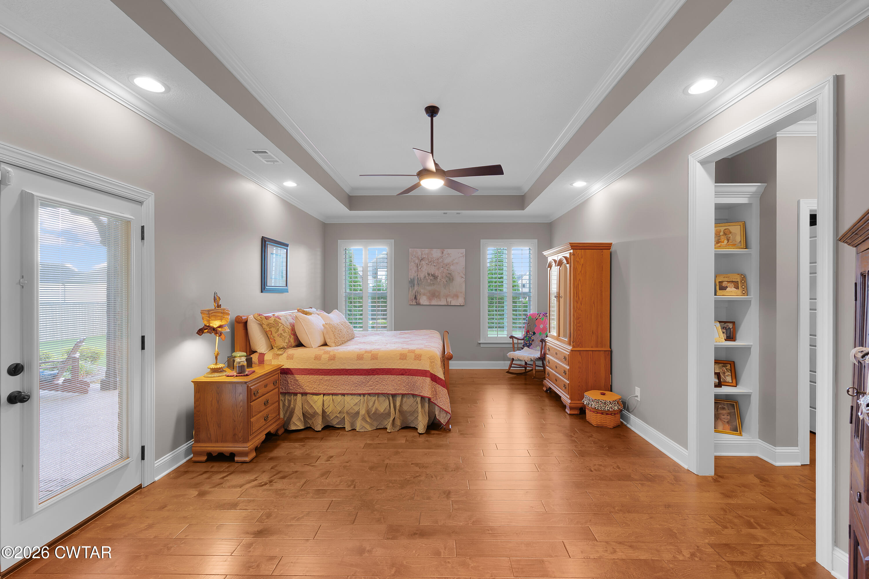 34 Cheddleton Cove Jackson, TN 38305 - Photo 10 of 32 a bedroom with furniture and window