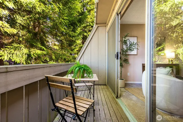 a view of balcony with furniture