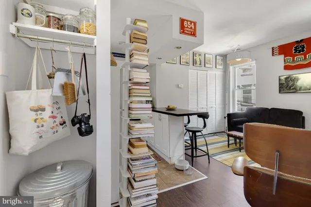 a view of a livingroom with furniture and windows