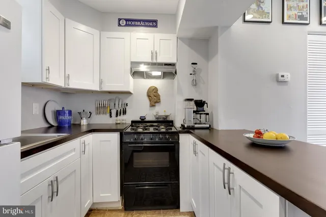 a view of a chairs and table in the patio