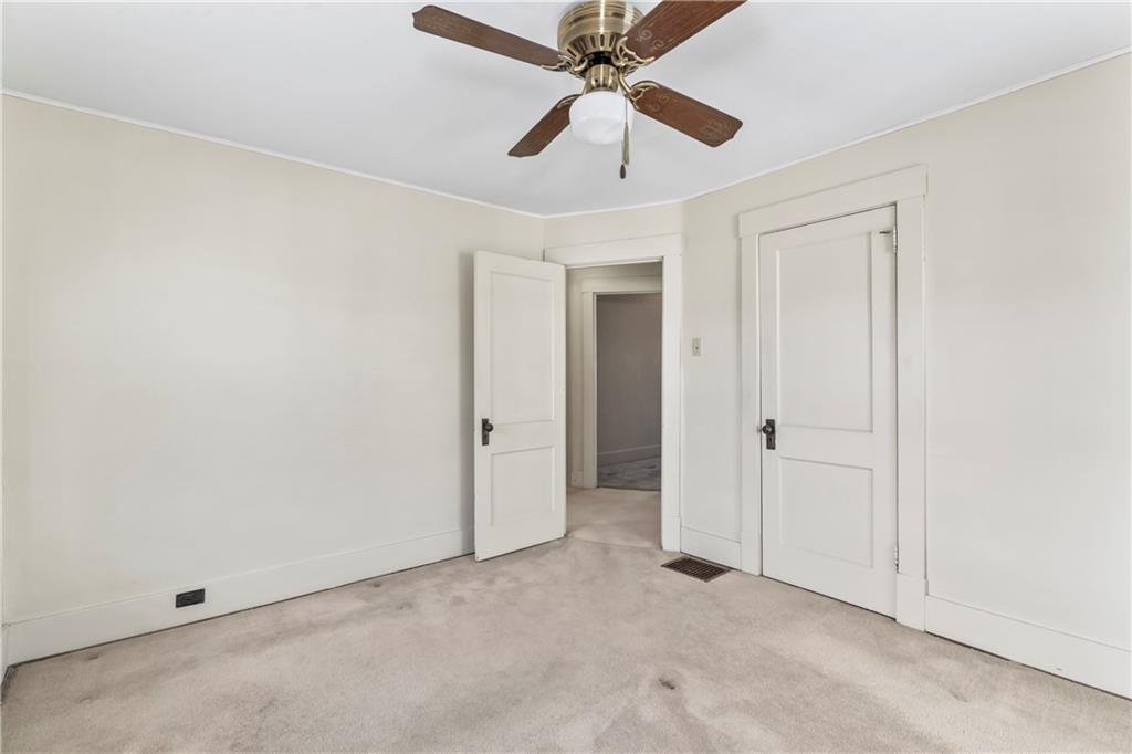 745 Bank Street Beaver, PA 15009 - Photo 18 of 30 an empty room with chandelier fan