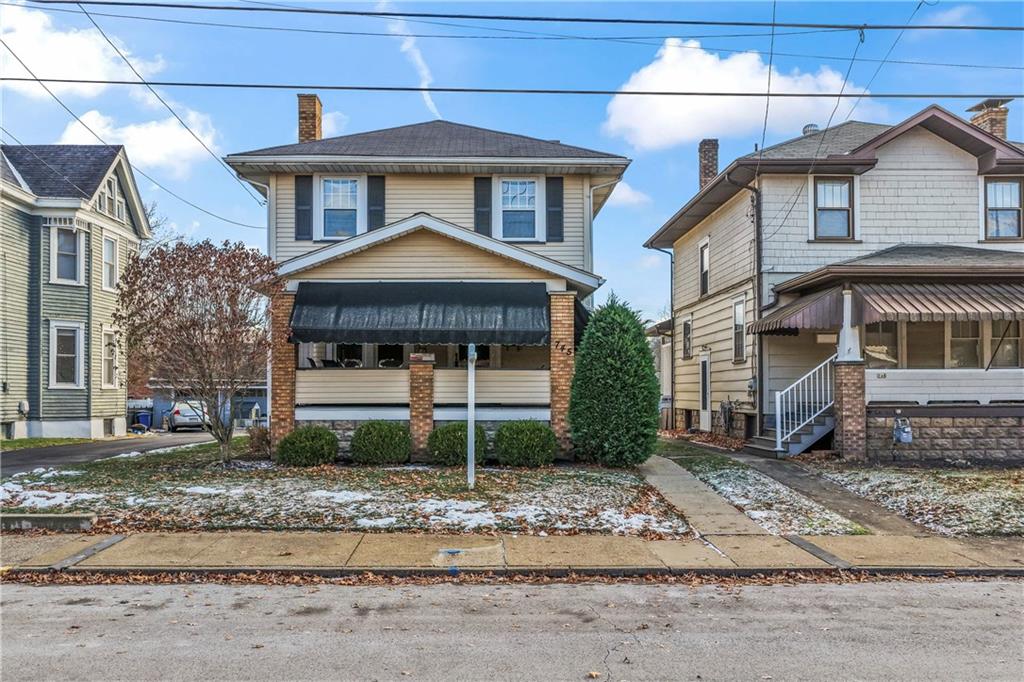 745 Bank Street Beaver, PA 15009 - Photo 2 of 30 a front view of a house with a yard