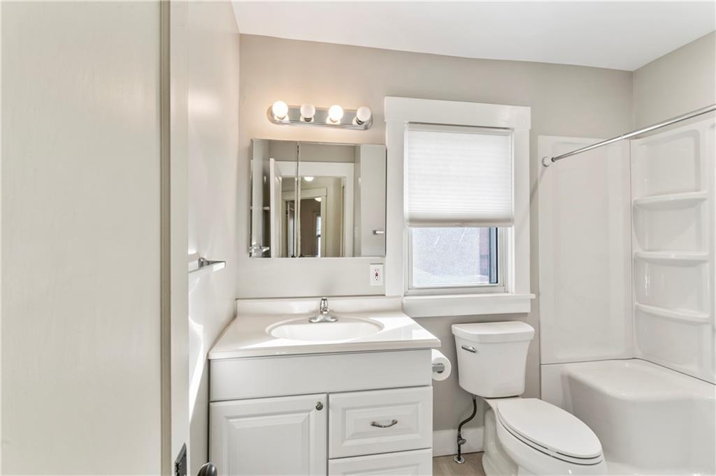 745 Bank Street Beaver, PA 15009 - Photo 21 of 30 a bathroom with a toilet sink and mirror