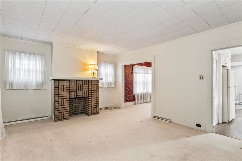 745 Bank Street Beaver, PA 15009 - Photo 6 of 30 an empty room with windows