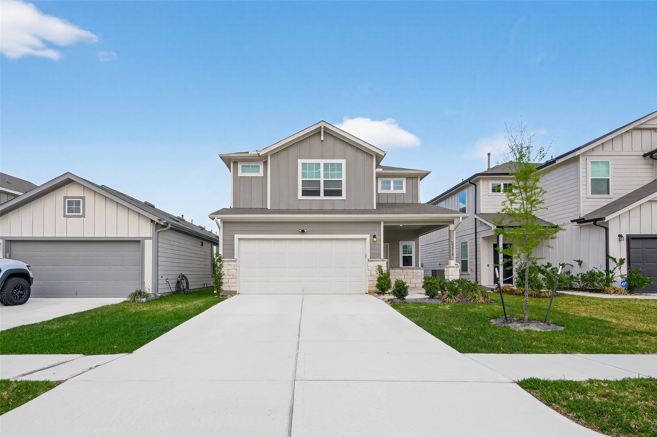23514 Fallen Cone Street Spring, TX 77373 - Photo 4 of 48 a front view of a house with a yard