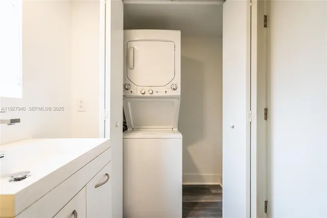 a utility room with dryer and washer