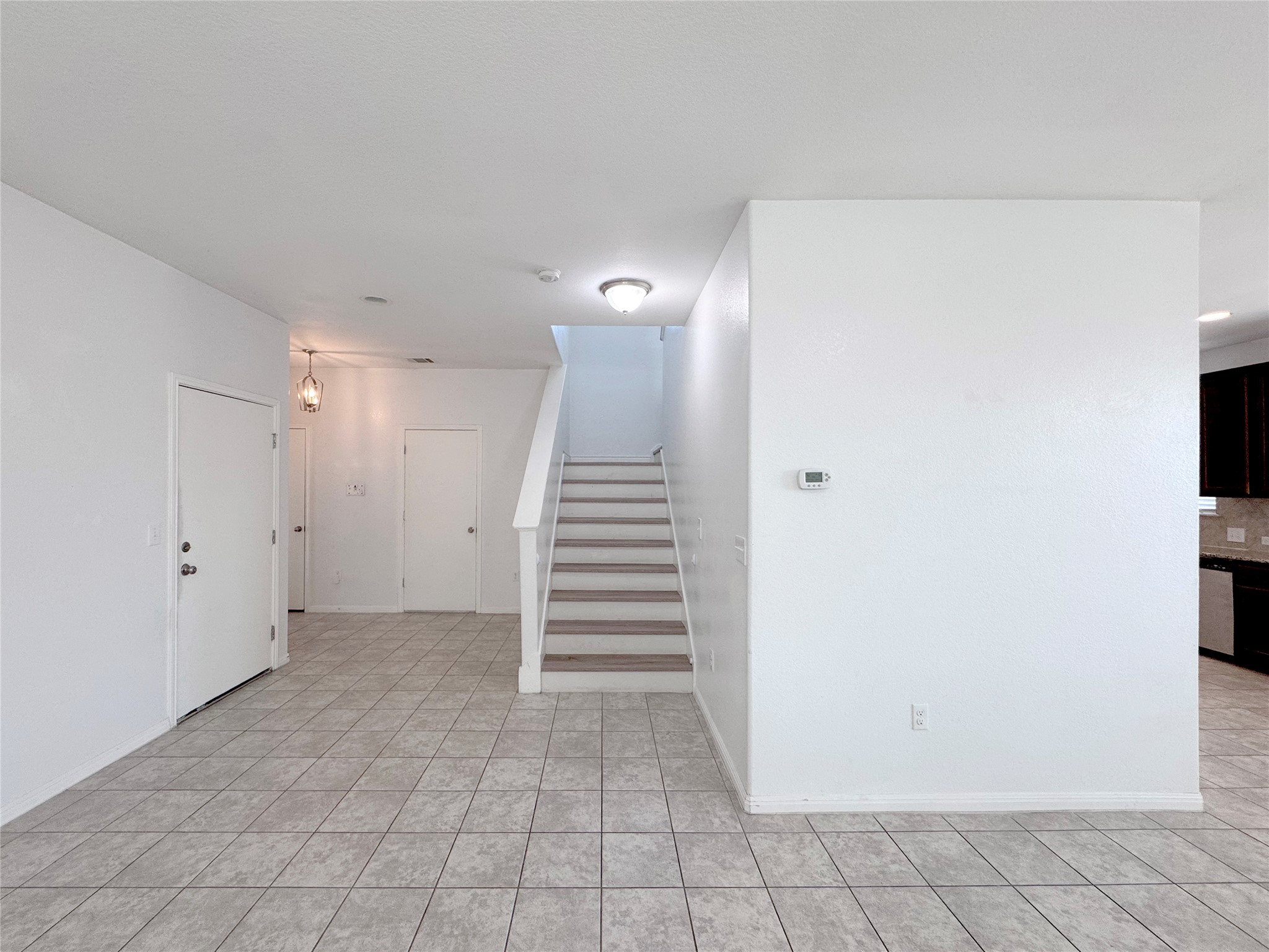 251 Triumph Road Buda, TX 78610 - Photo 12 of 24 Stairs with baseboards