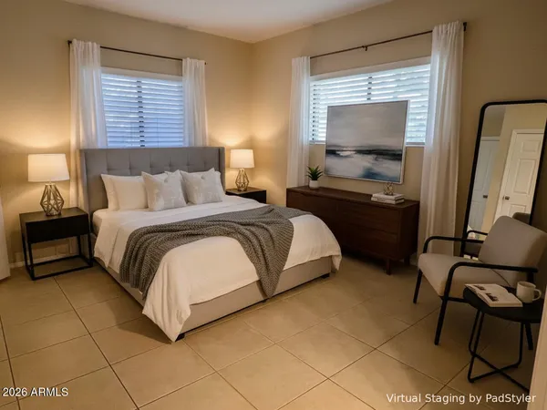 a view of a hallway with a fireplace and cabinet