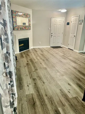 a view of a livingroom with a fireplace