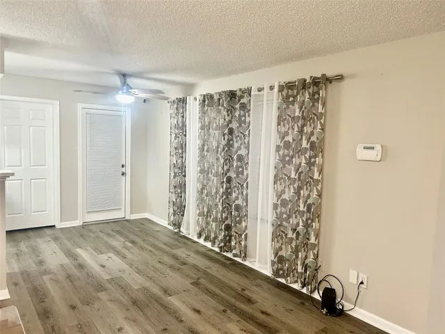 a view of a room with natural light