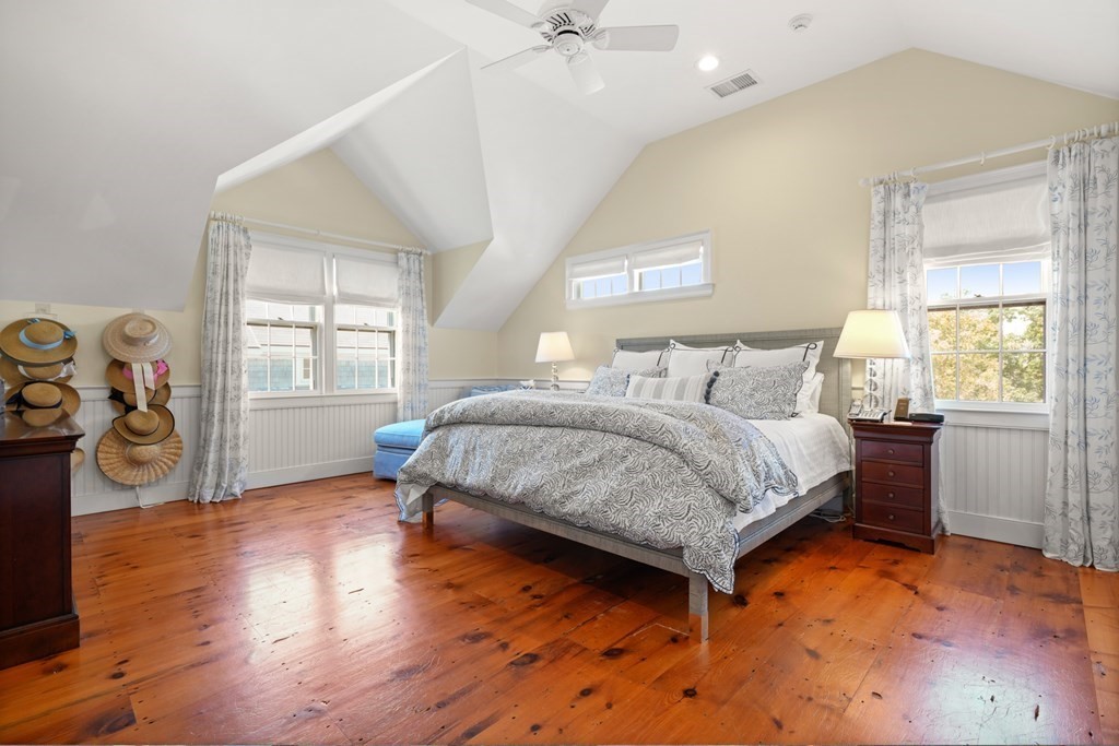 39 Milk Street Nantucket, MA 02554 - Photo 16 of 22 a bedroom with a bed and a window