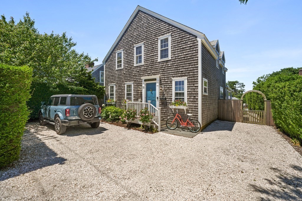 39 Milk Street Nantucket, MA 02554 - Photo 2 of 22 a view of a house with a patio