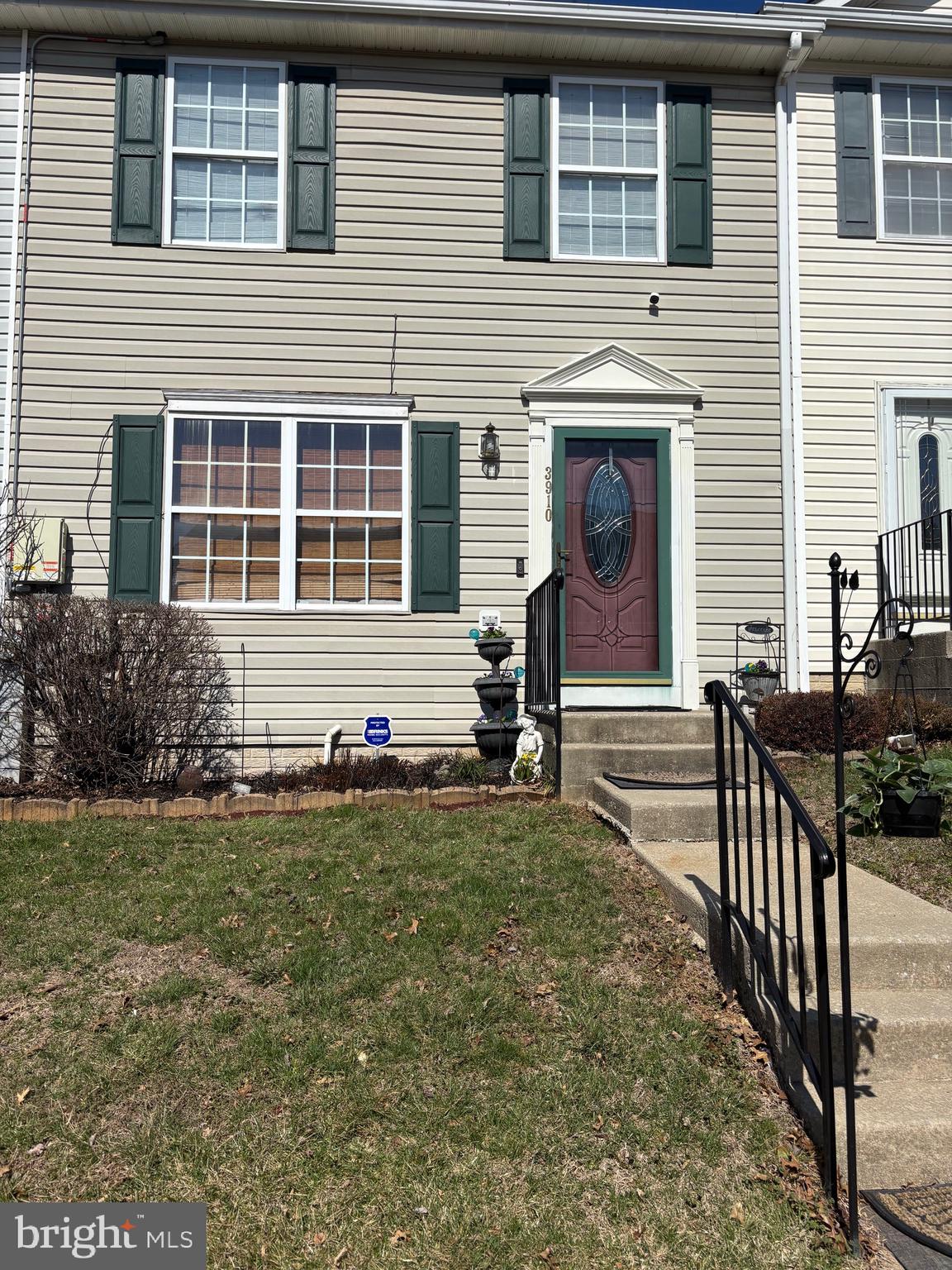 3910 Squire Tuck Way Baltimore, MD 21208 - Photo 1 of 40 a front view of house with yard