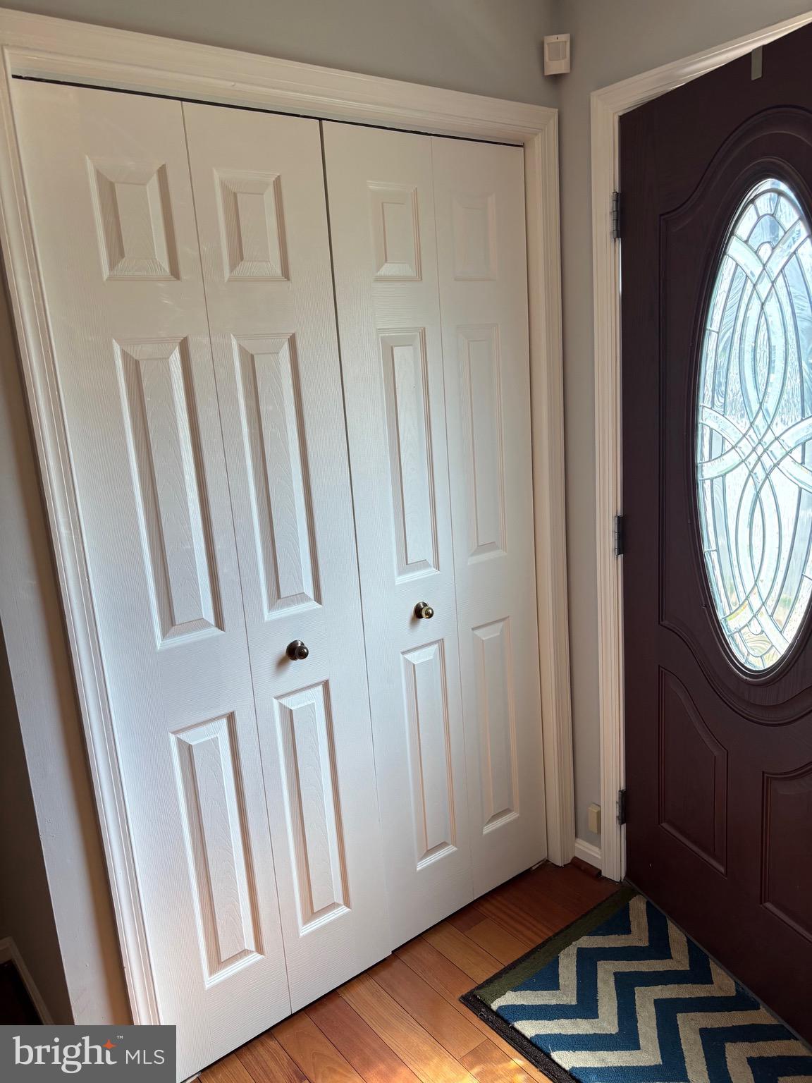 3910 Squire Tuck Way Baltimore, MD 21208 - Photo 2 of 40 a view of front door with wooden floor
