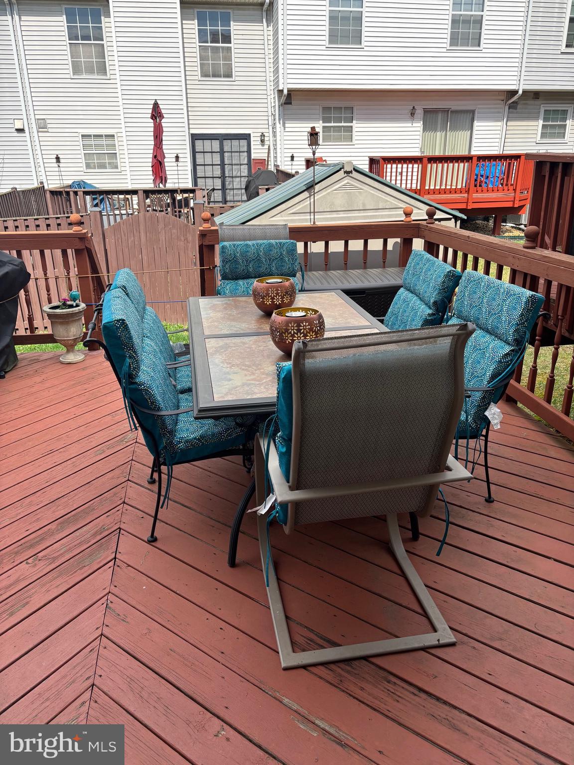 3910 Squire Tuck Way Baltimore, MD 21208 - Photo 35 of 40 a view of a chairs and table on the terrace