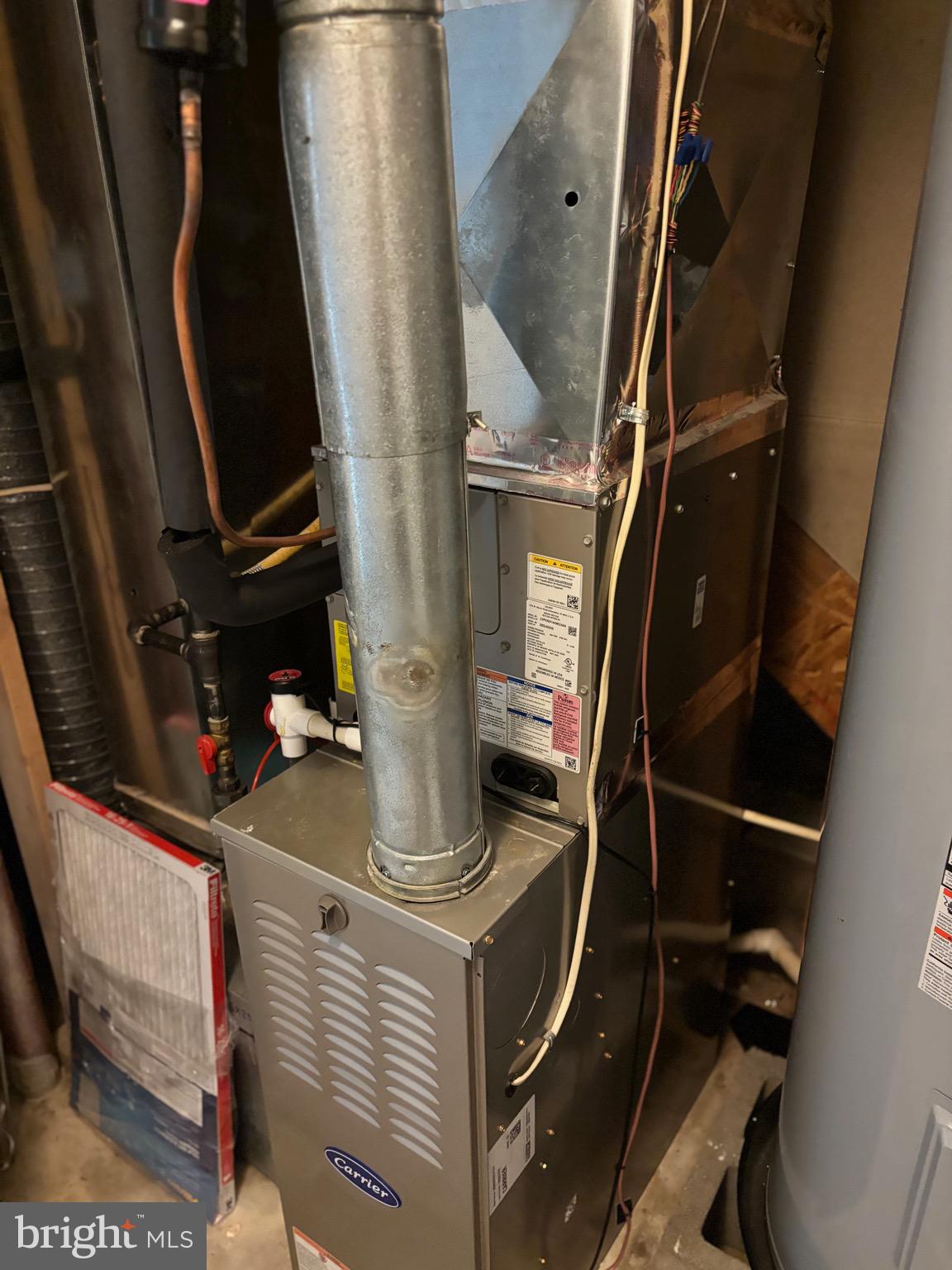 3910 Squire Tuck Way Baltimore, MD 21208 - Photo 37 of 40 a close view of water heater room