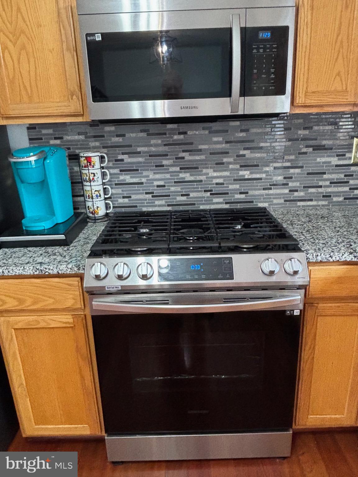 3910 Squire Tuck Way Baltimore, MD 21208 - Photo 9 of 40 a stove top oven sitting inside of a kitchen