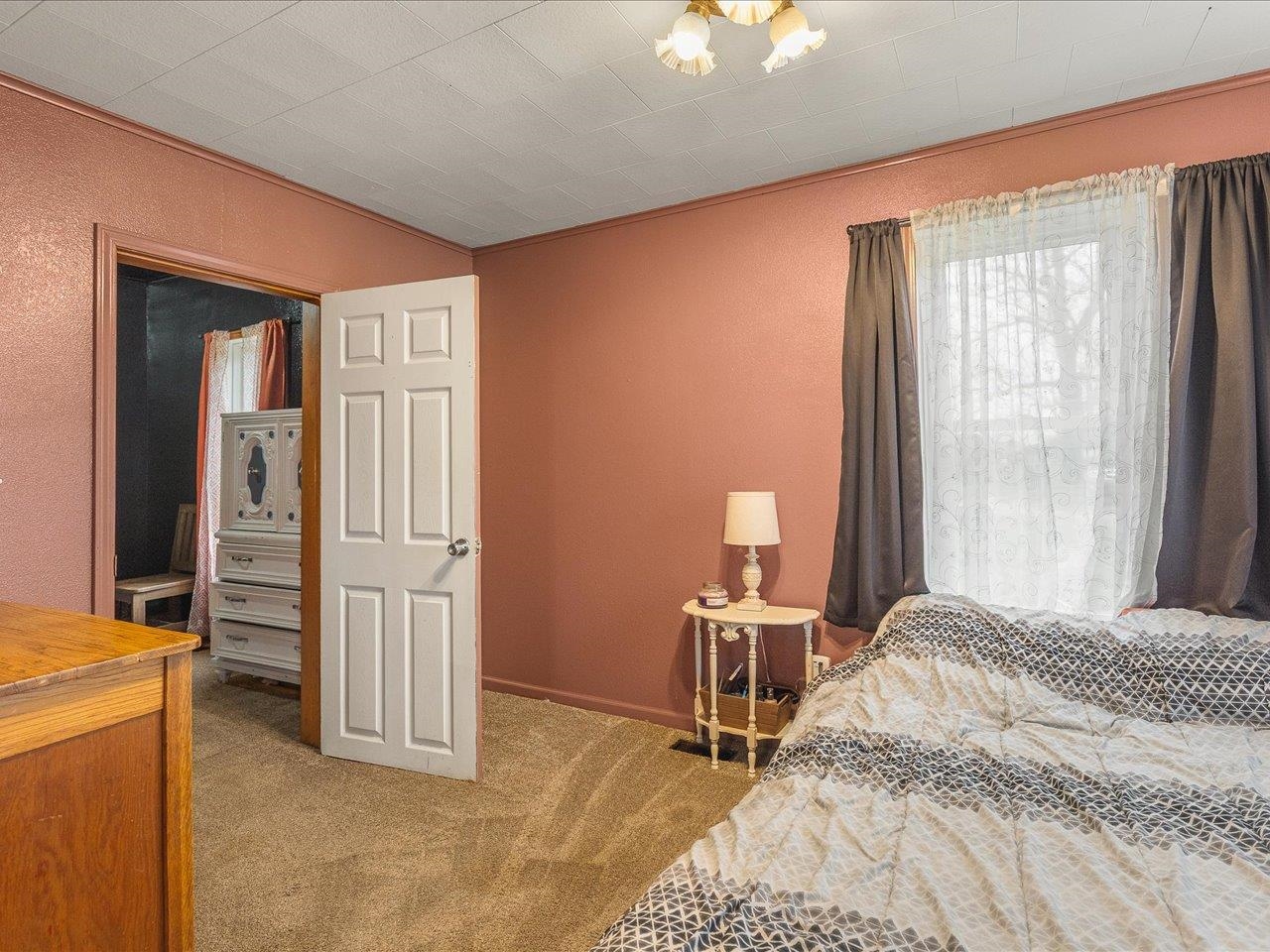 13514 Northeast Winslow Road Winslow, IL 61089 - Photo 19 of 31 a bedroom with a bed and a view of bedroom