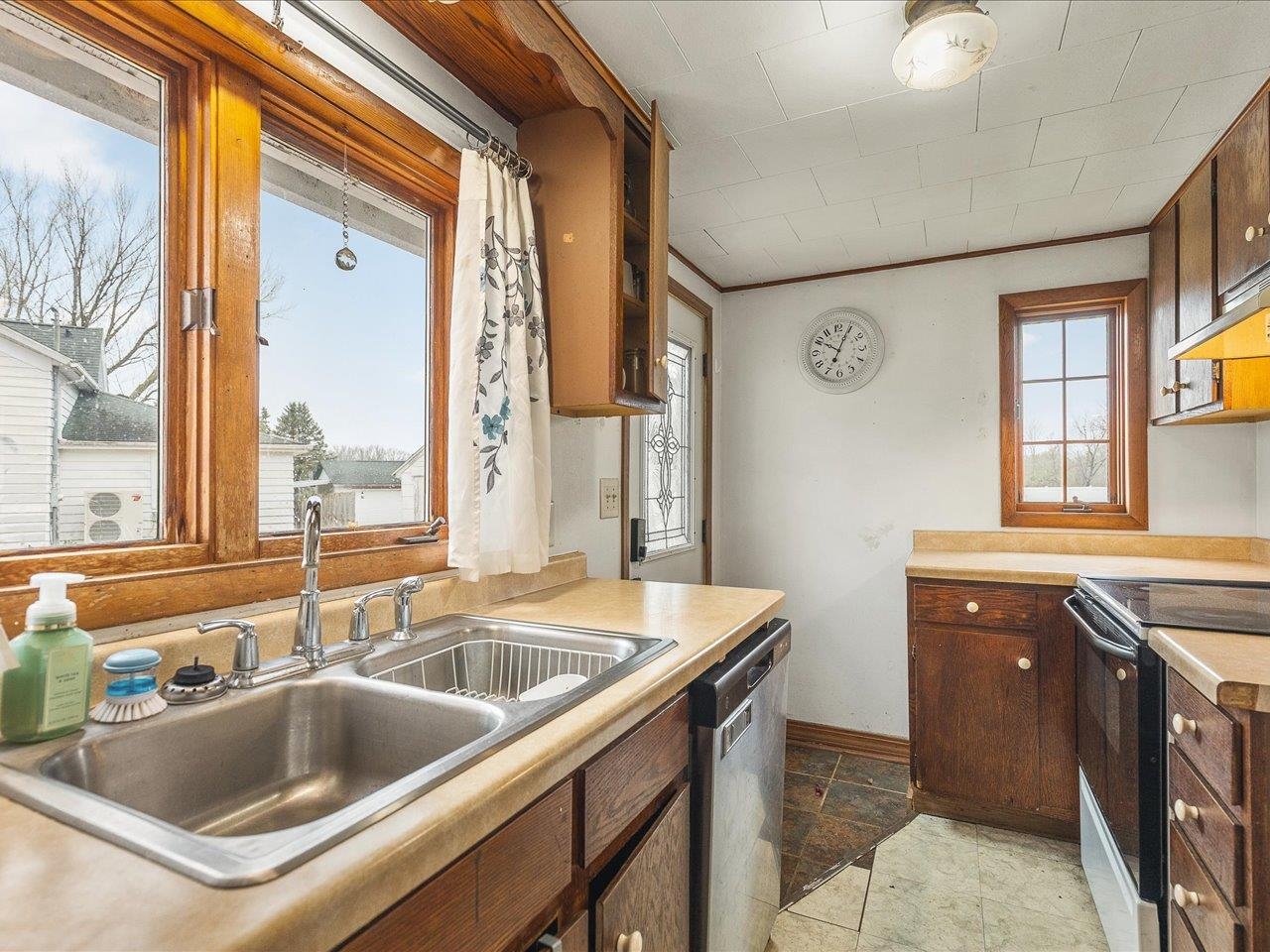 13514 Northeast Winslow Road Winslow, IL 61089 - Photo 2 of 31 a kitchen with a sink and a window