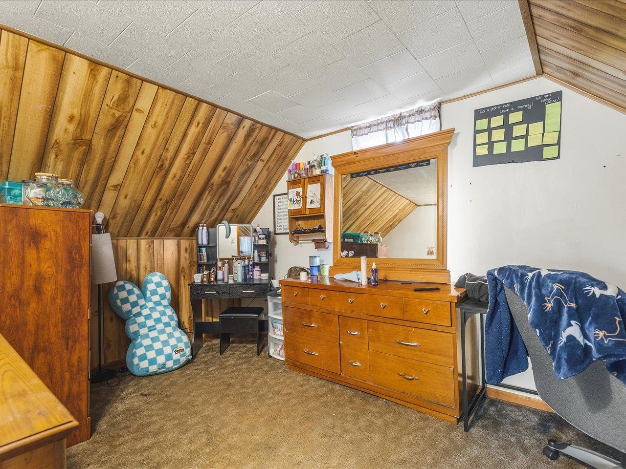 13514 Northeast Winslow Road Winslow, IL 61089 - Photo 22 of 31 a bedroom with a bed and a window
