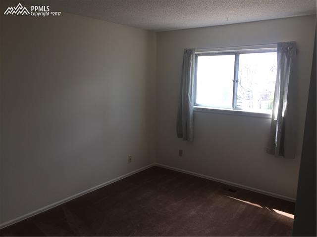2441 Ranch Lane Colorado Springs, CO 80918 - Photo 9 of 24 Upstairs 2nd Bedroom