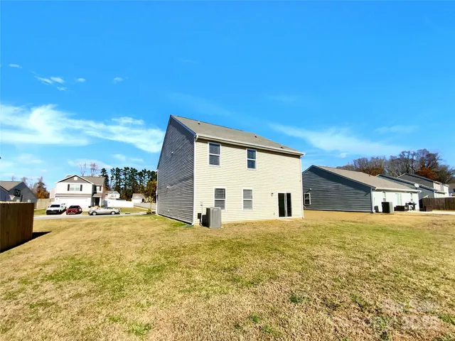 a view of a house with a big yard
