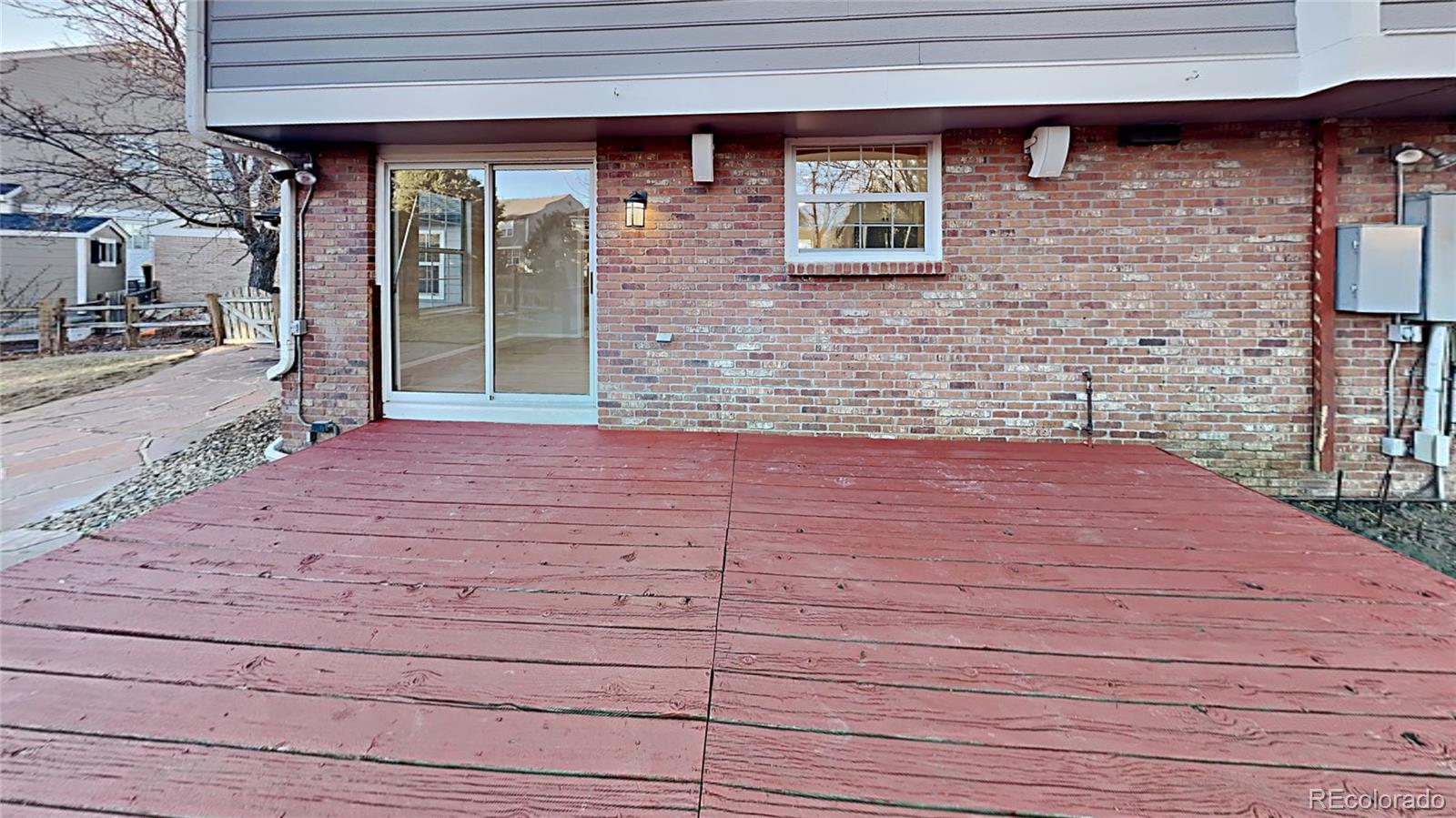 8774 Forrest Court Highlands Ranch, CO 80126 - Photo 14 of 31 a view of a backyard of a house