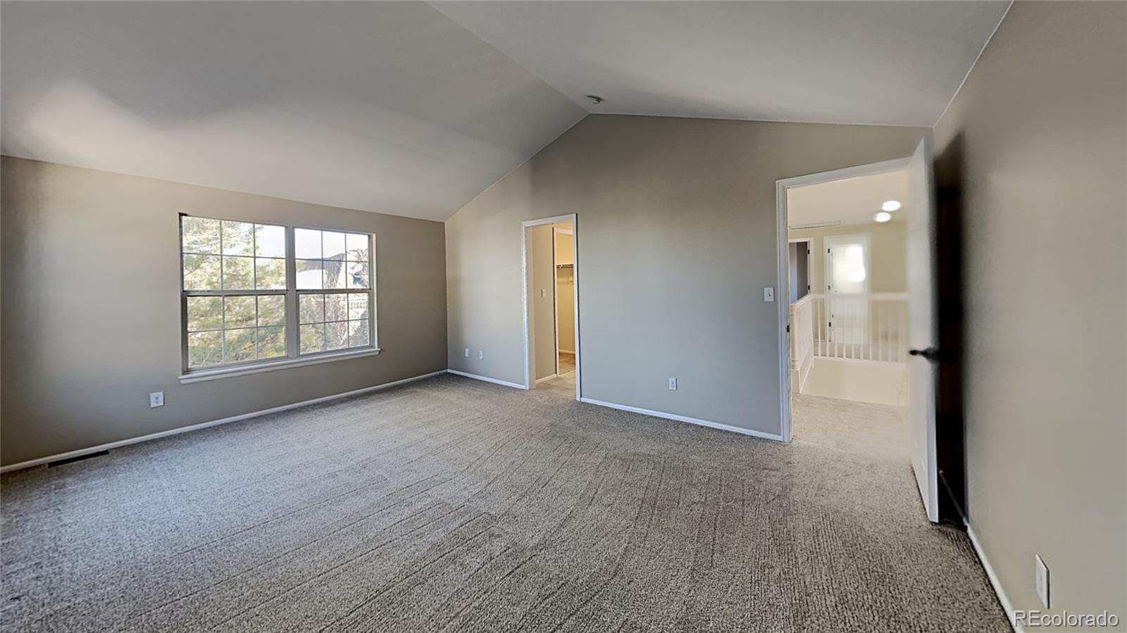 8774 Forrest Court Highlands Ranch, CO 80126 - Photo 16 of 31 an empty room with windows and closet