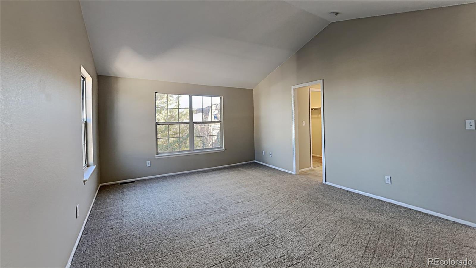 8774 Forrest Court Highlands Ranch, CO 80126 - Photo 17 of 31 an empty room with windows