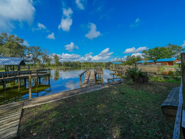 a view of a swimming pool with a patio