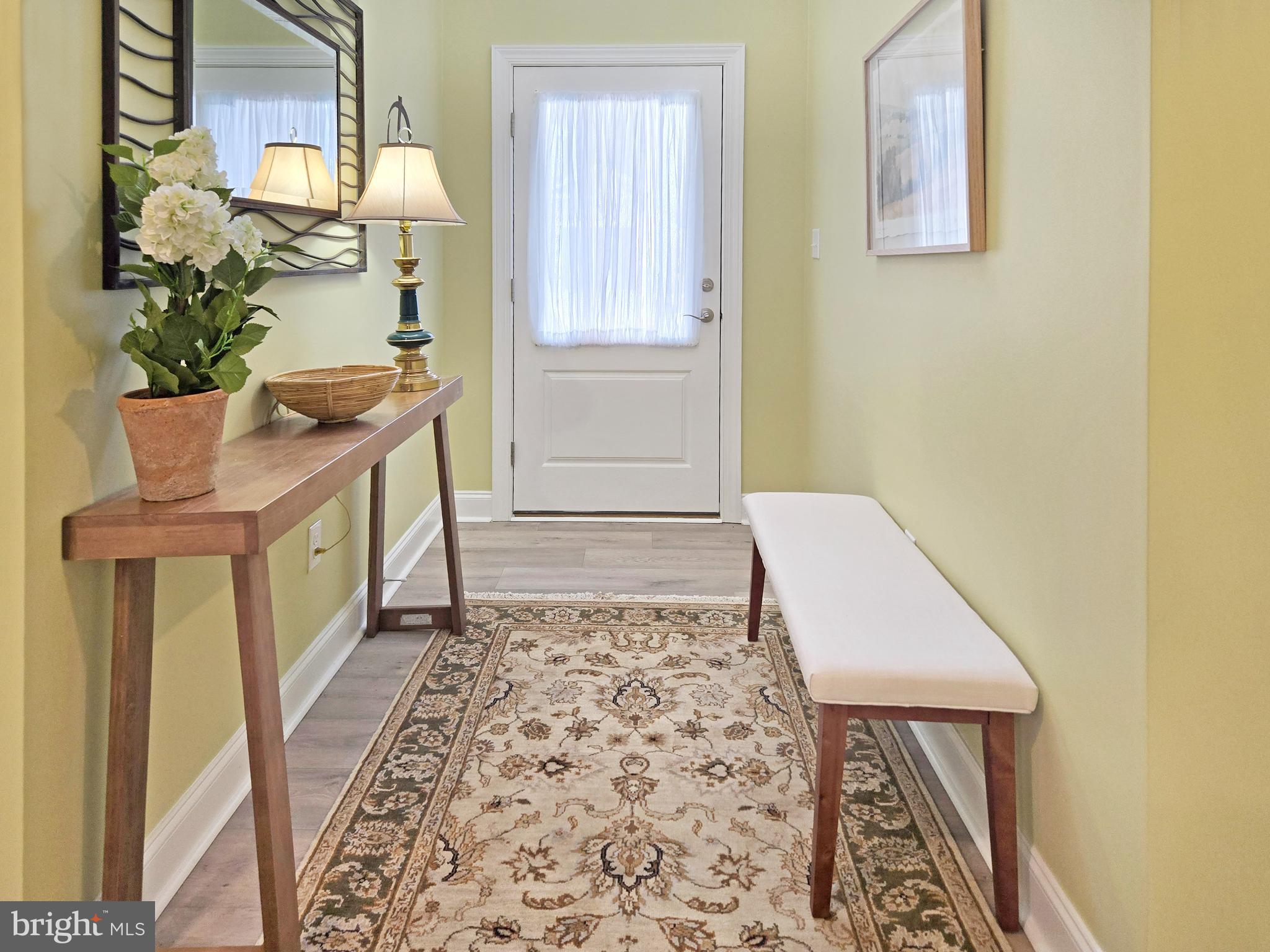 33768 Catching Cove Lewes, DE 19958 - Photo 11 of 69 a bathroom with a sink and a mirror