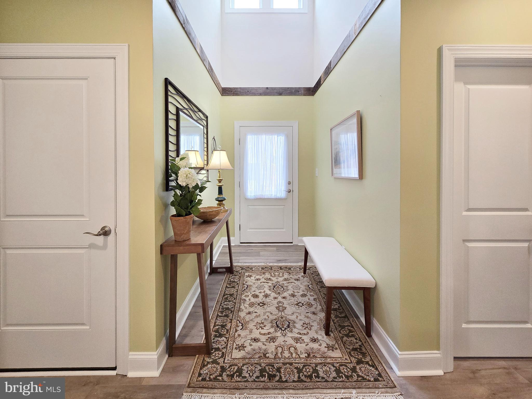 33768 Catching Cove Lewes, DE 19958 - Photo 12 of 69 a living room with furniture and a rug