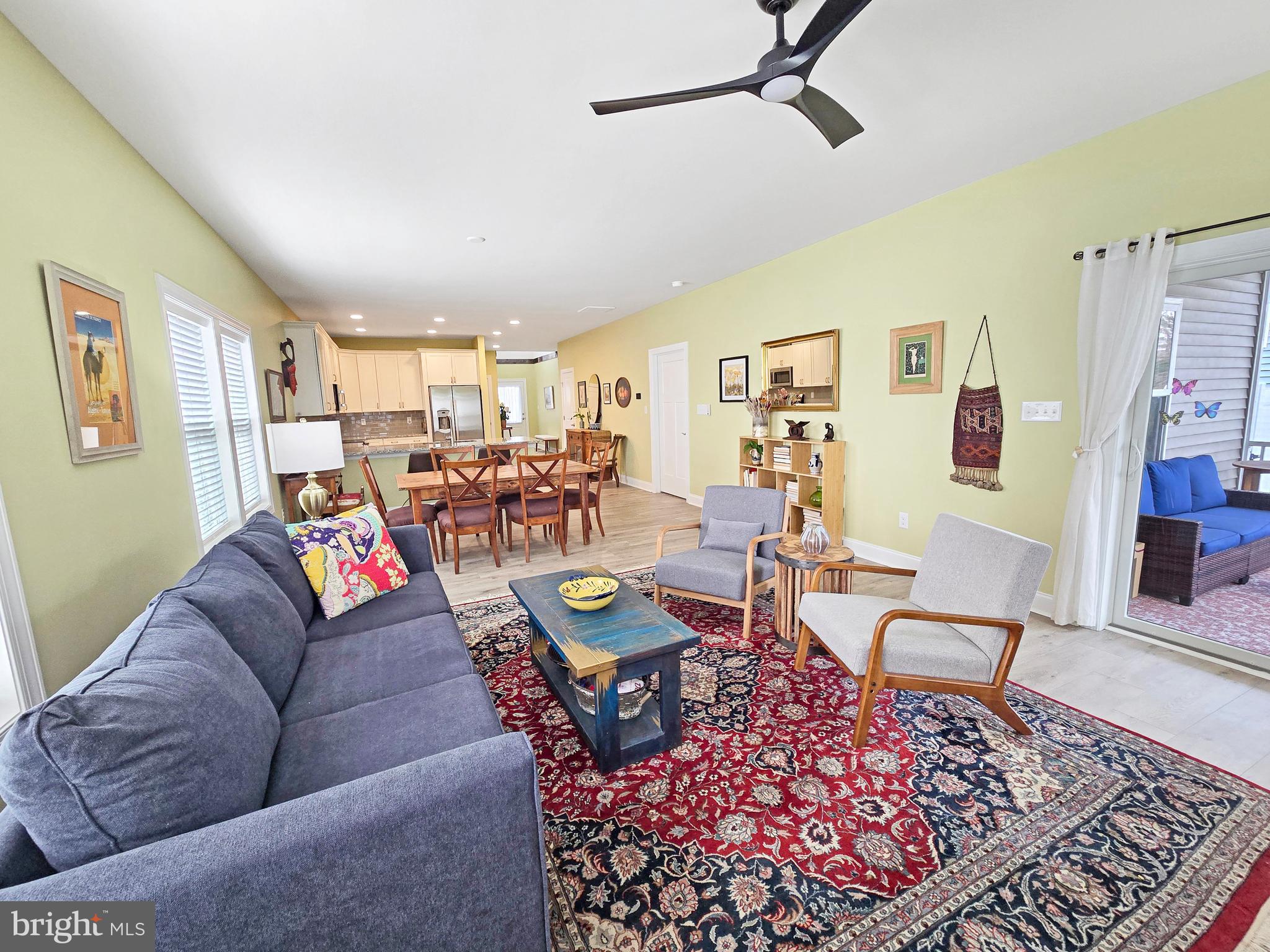 33768 Catching Cove Lewes, DE 19958 - Photo 21 of 69 a living room with furniture and wooden floor
