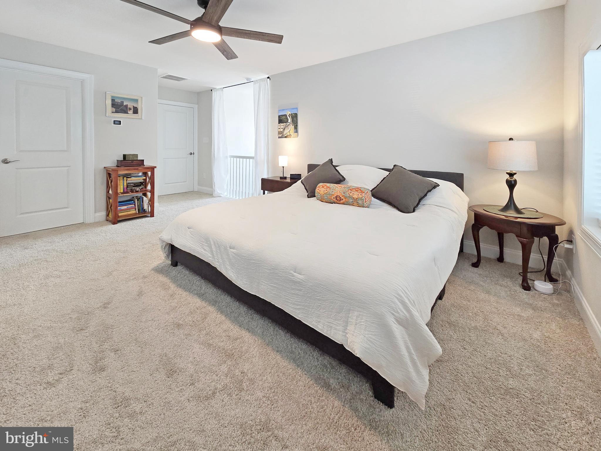 33768 Catching Cove Lewes, DE 19958 - Photo 27 of 69 a bedroom with bed and window