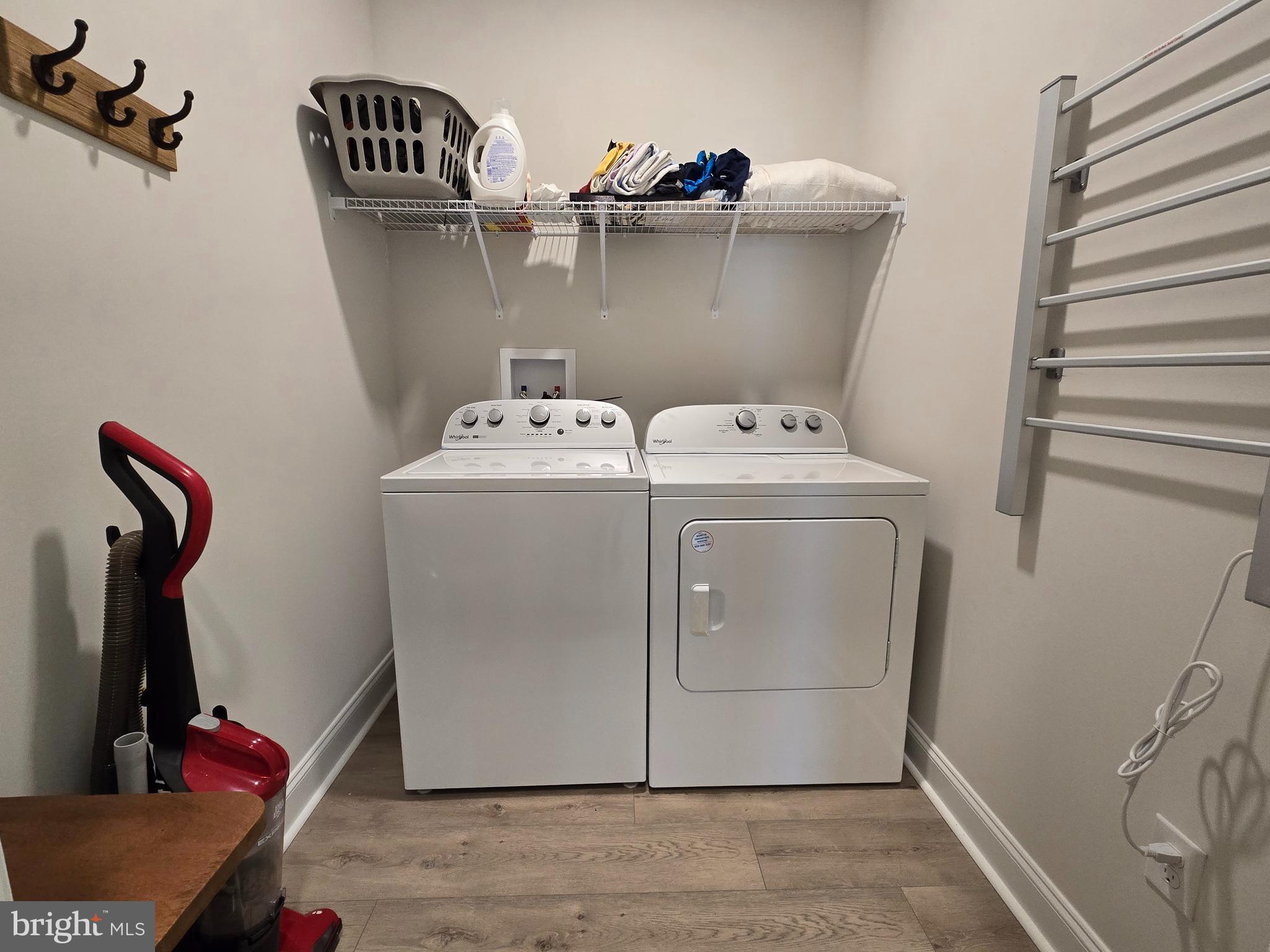 33768 Catching Cove Lewes, DE 19958 - Photo 41 of 69 a utility room with dryer and washer
