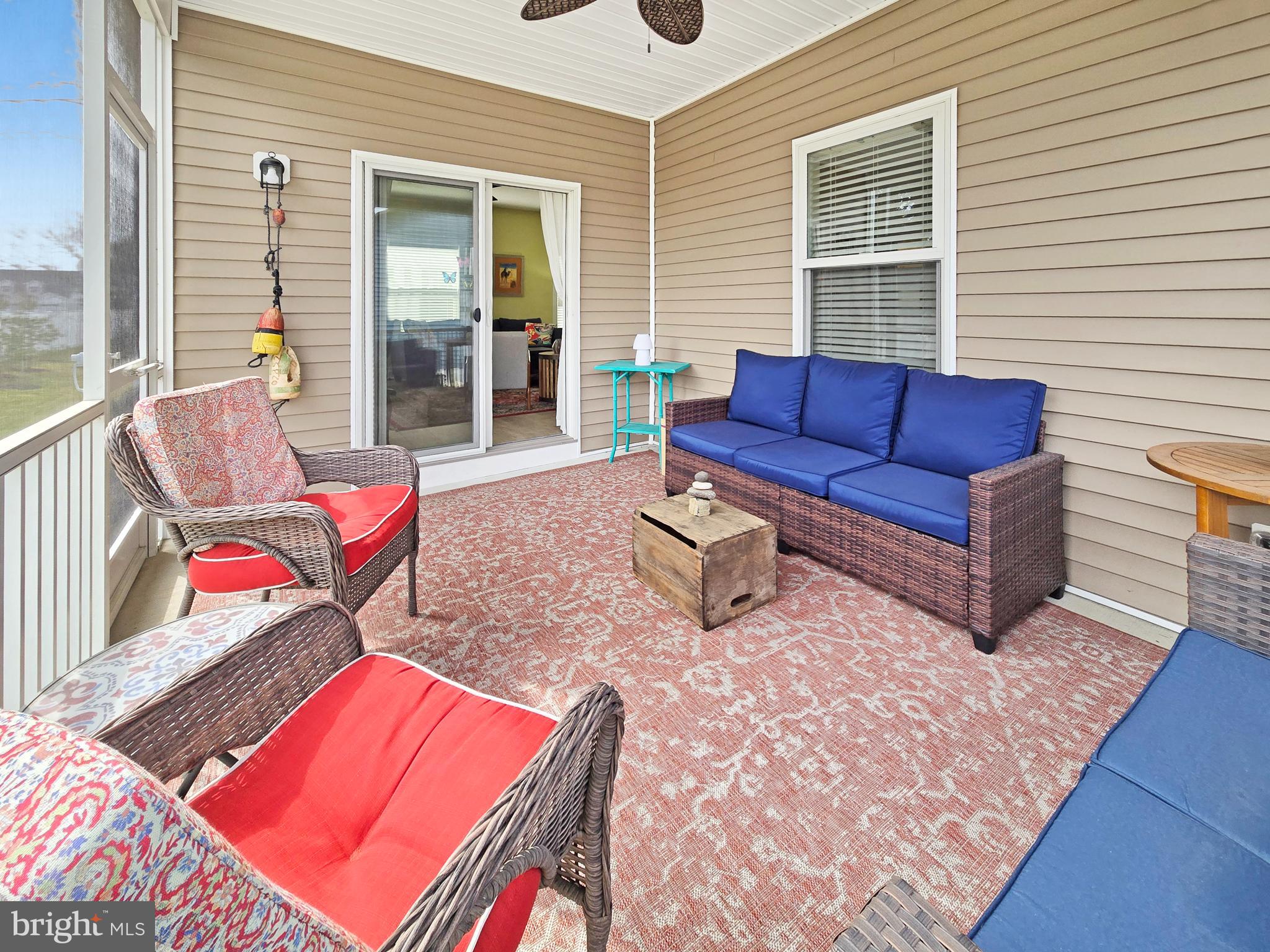 33768 Catching Cove Lewes, DE 19958 - Photo 44 of 69 a outdoor living space with furniture and a window
