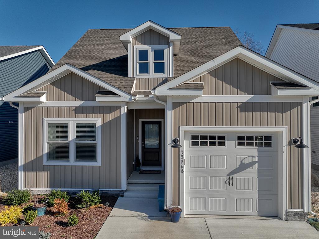 33768 Catching Cove Lewes, DE 19958 - Photo 46 of 69 a front view of a house with windows