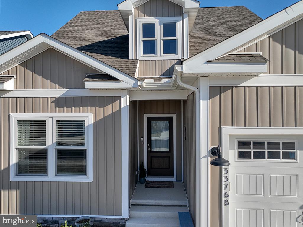 33768 Catching Cove Lewes, DE 19958 - Photo 47 of 69 a front view of a house with a balcony