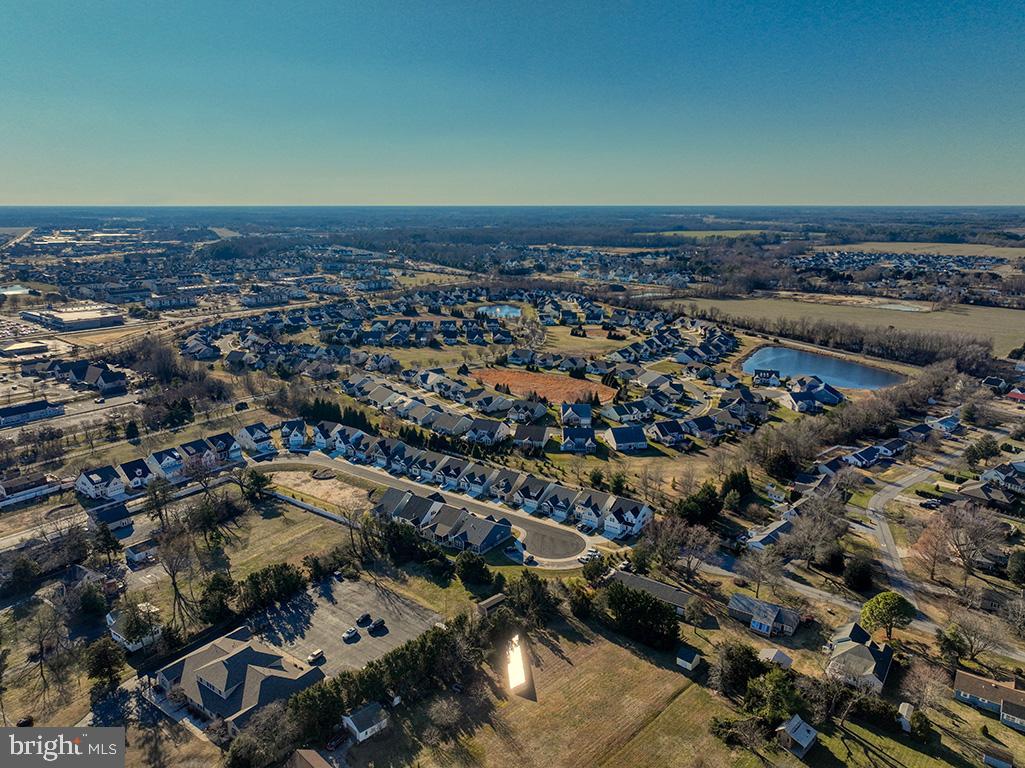 33768 Catching Cove Lewes, DE 19958 - Photo 53 of 69 an aerial view of a house with a ocean view