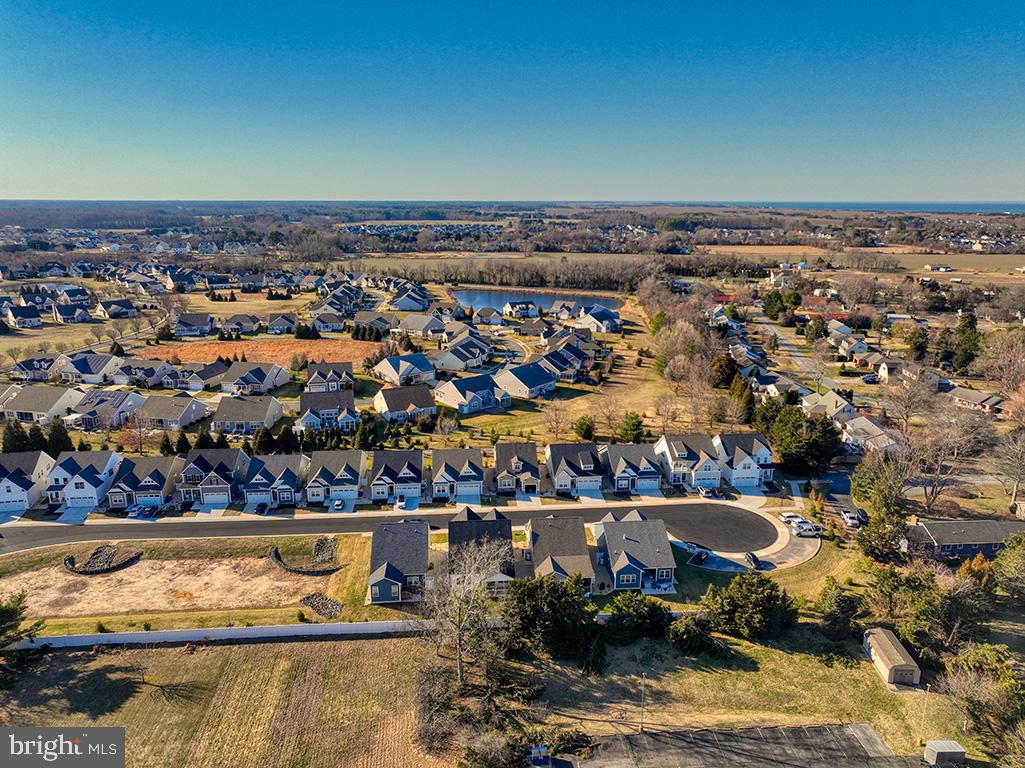 33768 Catching Cove Lewes, DE 19958 - Photo 57 of 69 an aerial view of a house with a ocean view