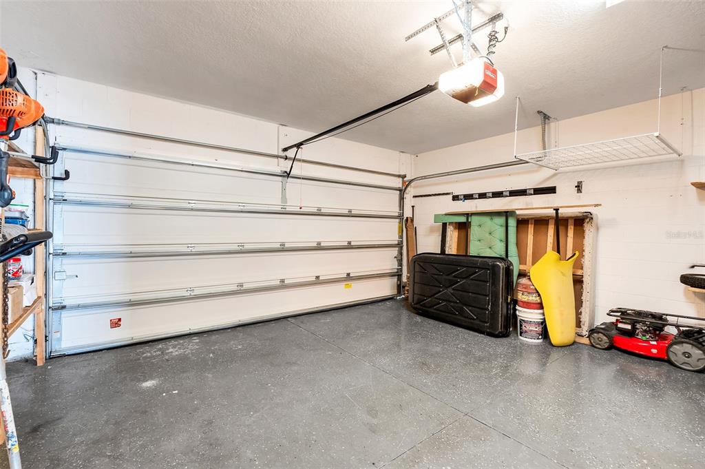 2620 Wadeview Loop St. Cloud, FL 34769 - Photo 27 of 38 a view of a livingroom with furniture and a ceiling fan
