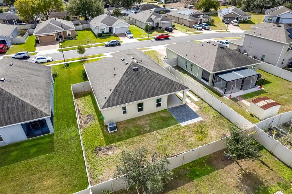 2620 Wadeview Loop St. Cloud, FL 34769 - Photo 34 of 38 a view of a house with a swimming pool