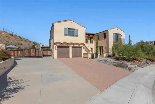 a view of living room filled with furniture and a potted plant